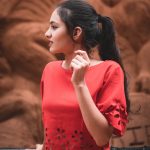 woman in red crew neck shirt